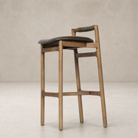 Nadia Bar + Counter Stool in Dulane Moss with warm wood finish and curved seat.