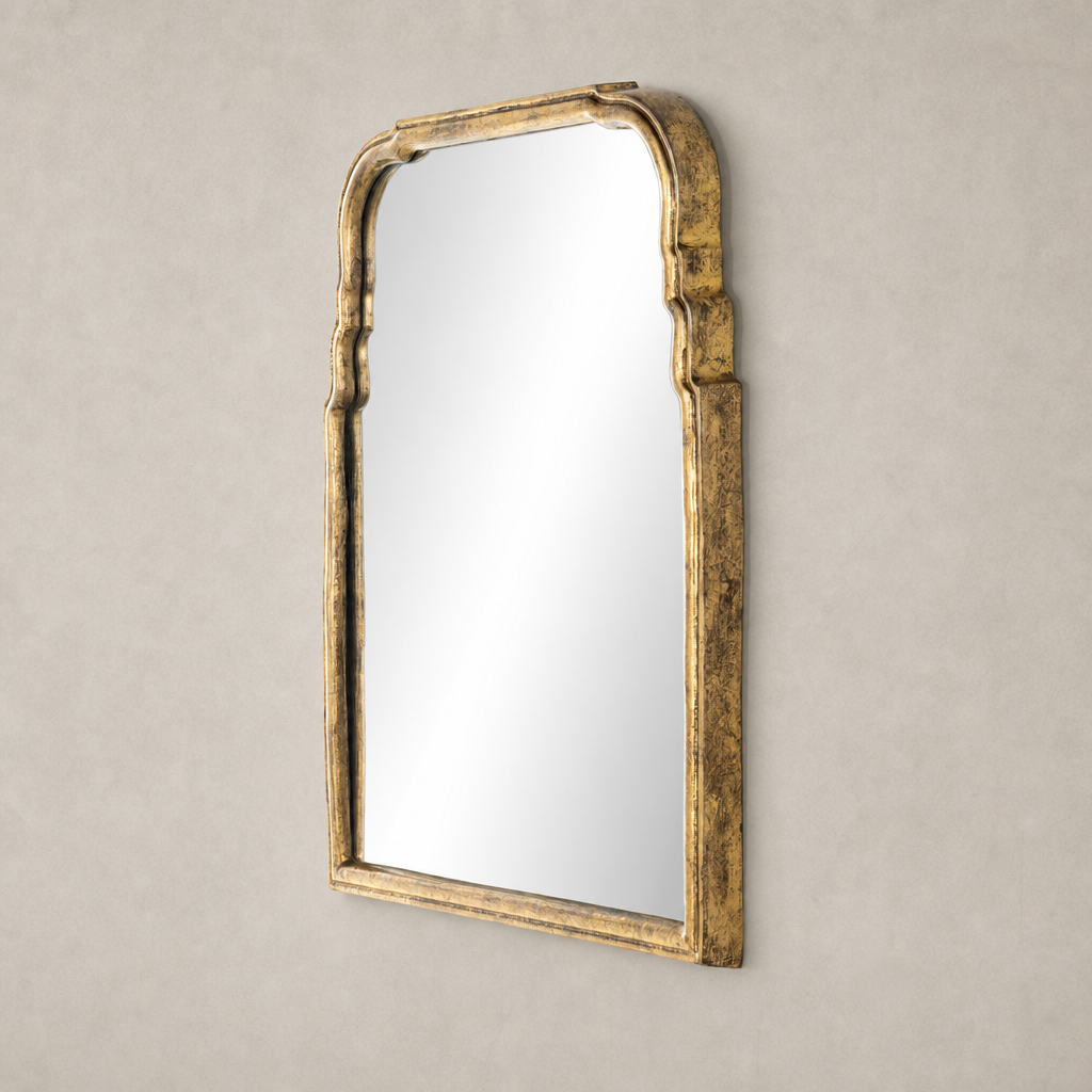 Rhone Mirror with an intricately sculpted antiqued gold leaf frame.