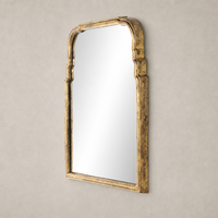Rhone Mirror with an intricately sculpted antiqued gold leaf frame.