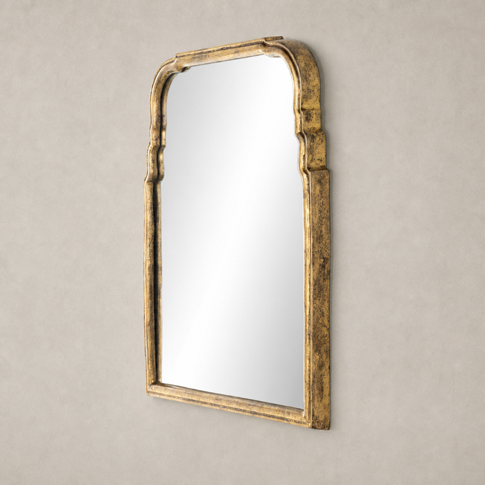 Rhone Mirror with an intricately sculpted antiqued gold leaf frame.