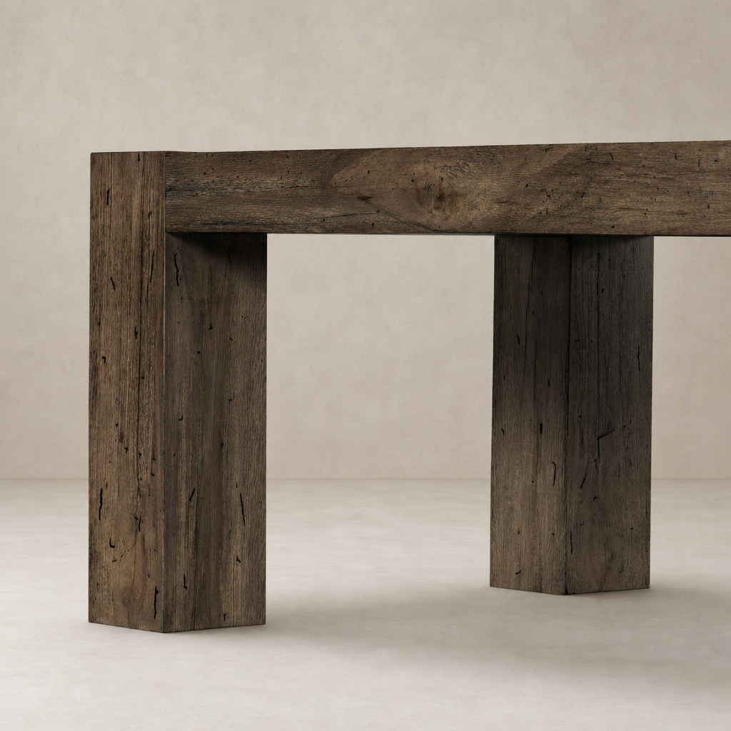 Brisa Dining Table featuring sturdy ebony rustic wormwood oak legs and textured finish.