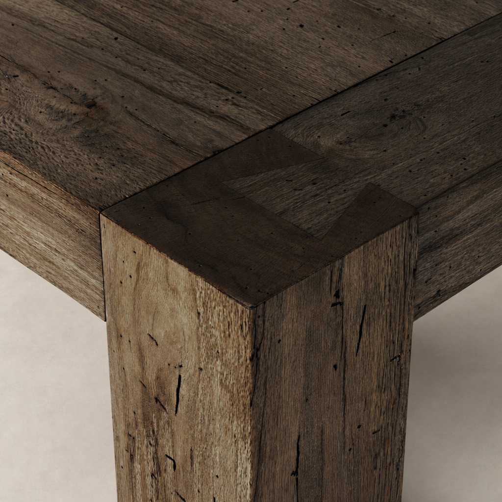 Detailed corner of the Brisa Dining Table in Ebony Rustic Wormwood Oak.