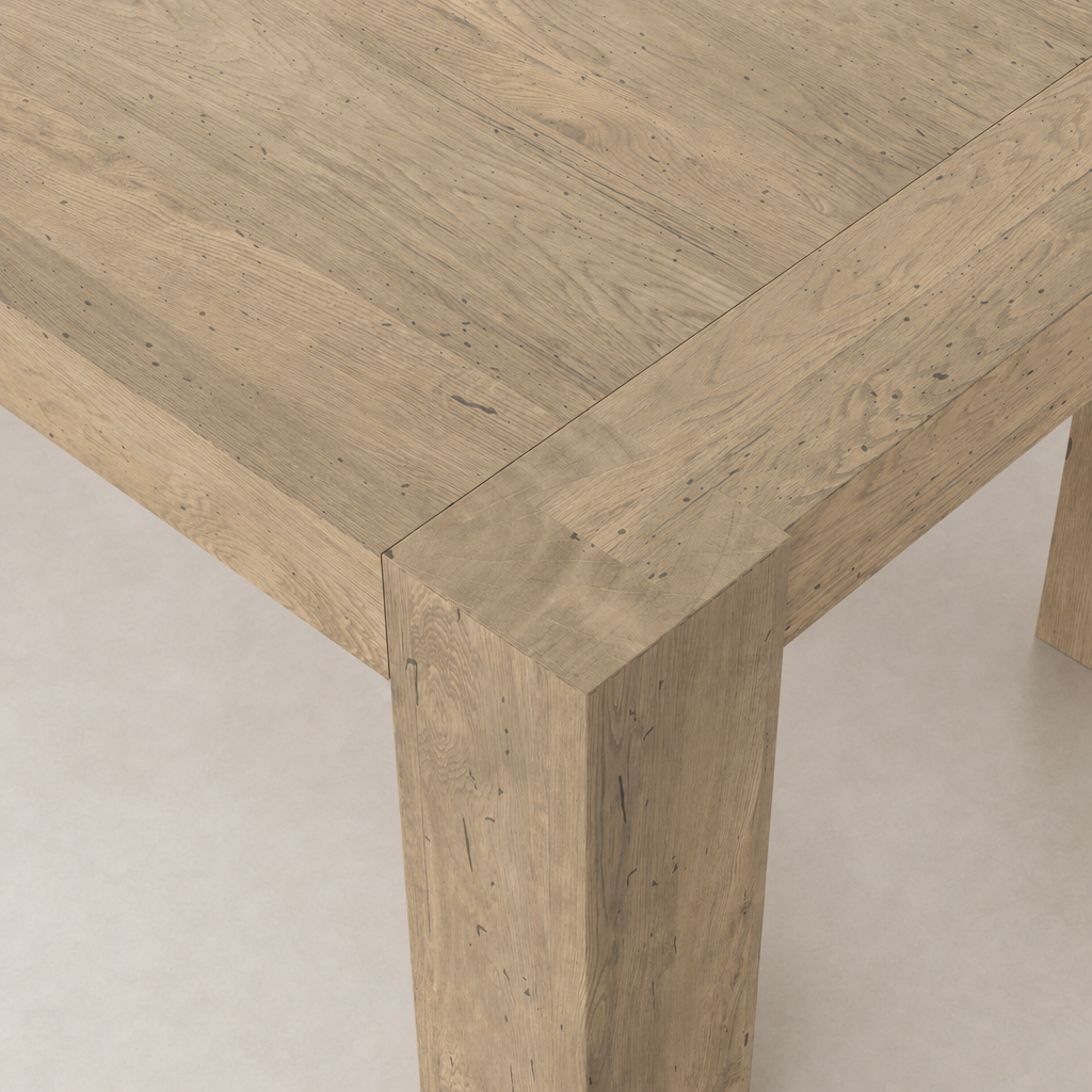 Brisa Dining Table in whitewash rustic wormwood oak with visible wood grain texture.