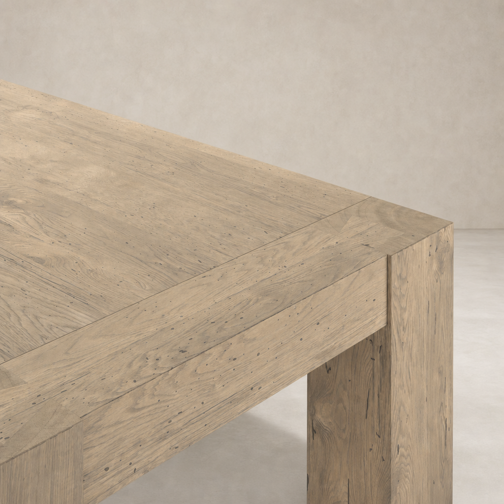 Brisa Dining Table in whitewash rustic wormwood oak with a textured grain finish.