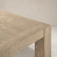 Brisa Dining Table in whitewash rustic wormwood oak with a textured grain finish.