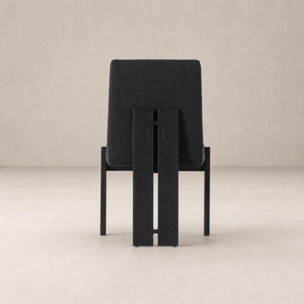 Romy Dining Chair in Gibson Black with a sleek design and textured fabric backrest.