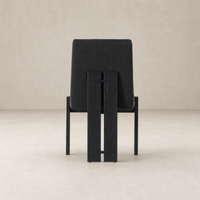 Romy Dining Chair in Gibson Black with a sleek design and textured fabric backrest.