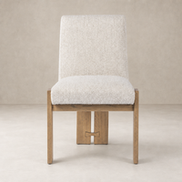Romy Dining Chair in Somerton Ash with a textured, cream upholstery and modern design.
