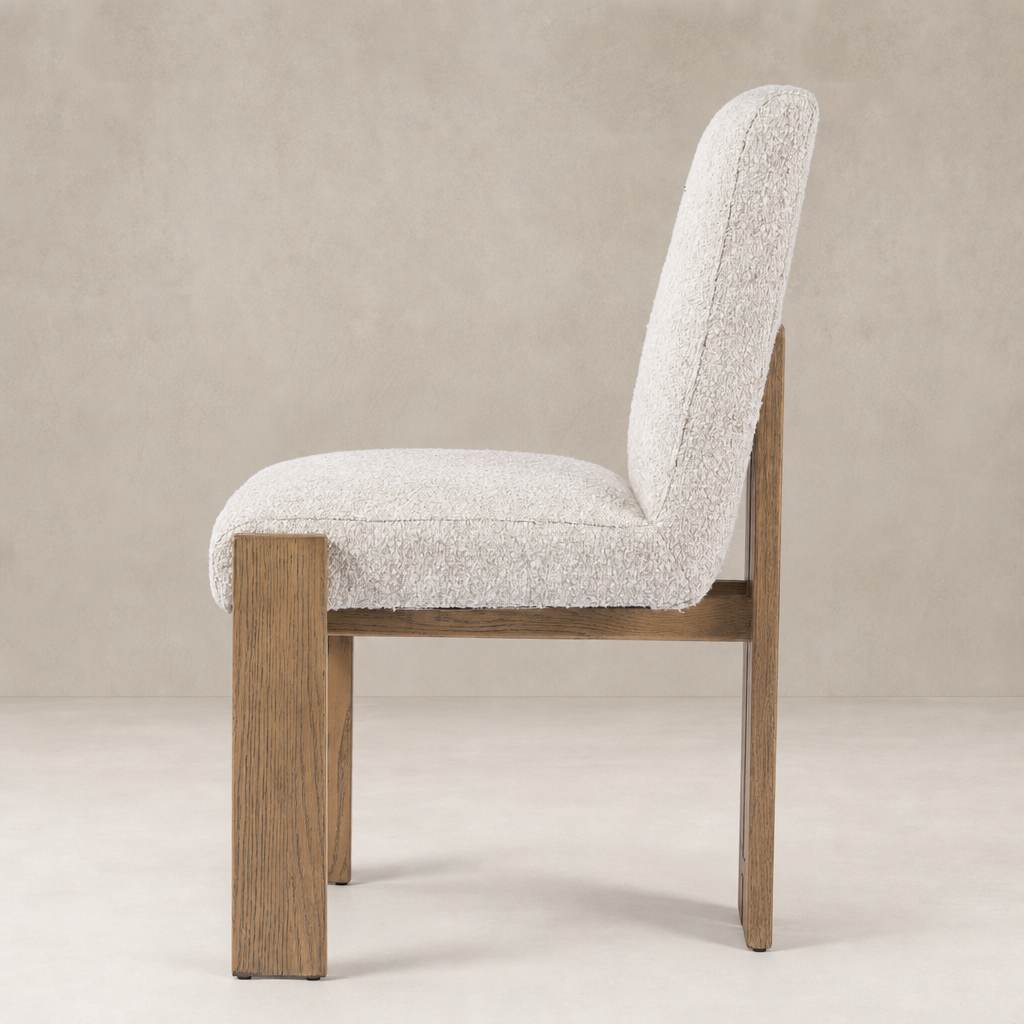 Romy Dining Chair in Somerton Ash with soft textured upholstery and sturdy wooden legs.