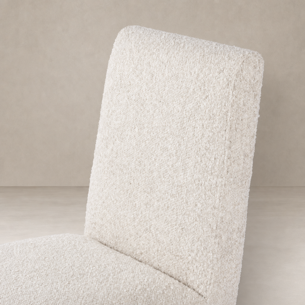 Romy Dining Chair in Somerton Ash with soft, textured upholstery and contemporary design.