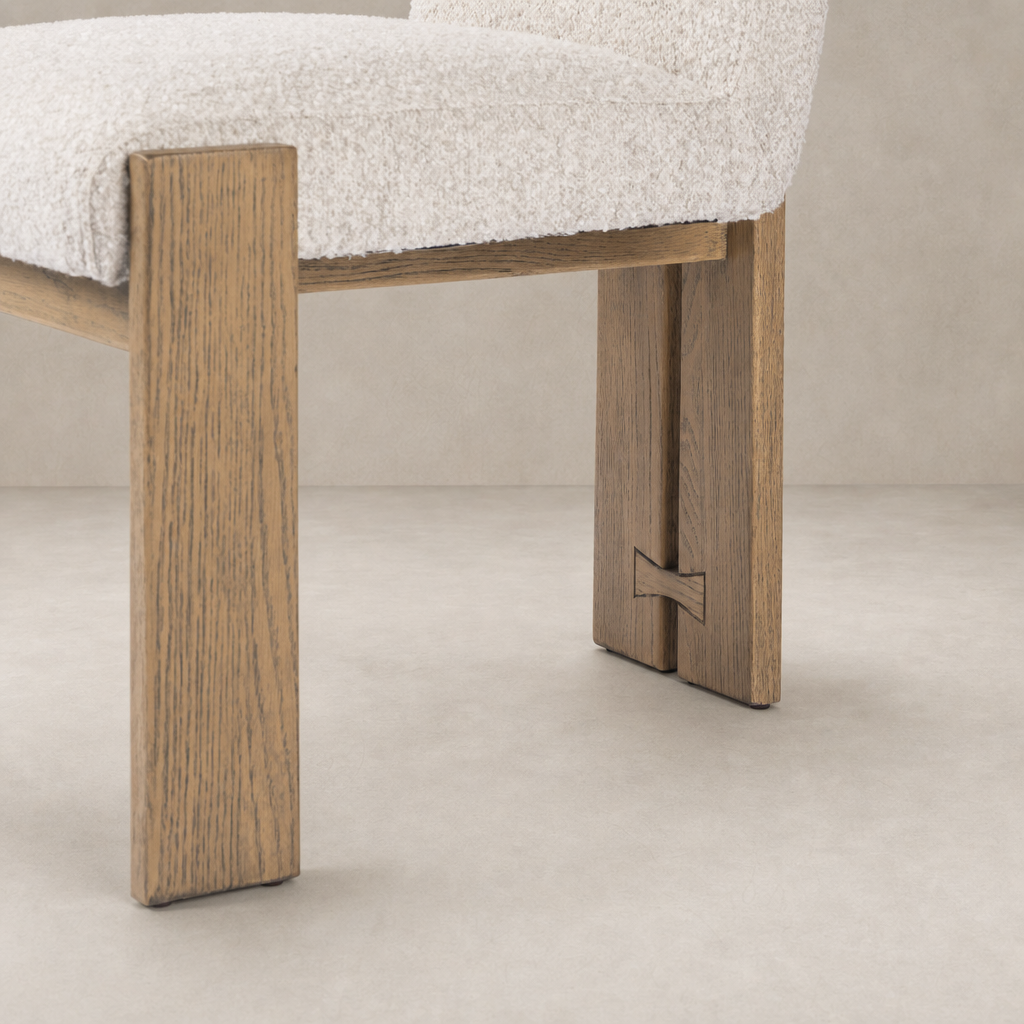 Romy Dining Chair in Somerton Ash with plush upholstery and sturdy wooden legs.