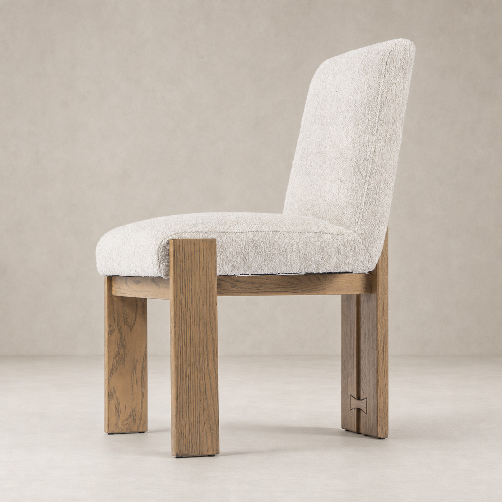 Romy Dining Chair in Somerton Ash with plush textured upholstery and sturdy wooden legs.