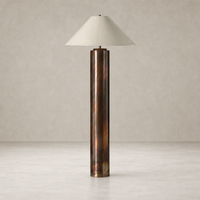 Iridescent acid wash floor lamp with a stylish conical shade and sleek design.