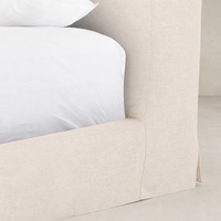 Slipcover bed in Brussels Natural with soft, textured fabric and clean lines.