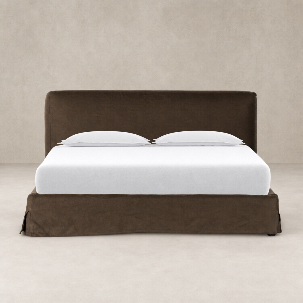 Slipcover bed in Brussels Coffee with a smooth finish and clean lines.
