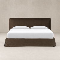 Slipcover bed in Brussels Coffee with a smooth finish and clean lines.
