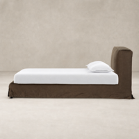 Slipcover bed in Brussels Coffee with a sleek design and soft fabric.