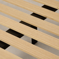 Close-up of a slipcover bed's wooden slats in Savoy Parchment finish.