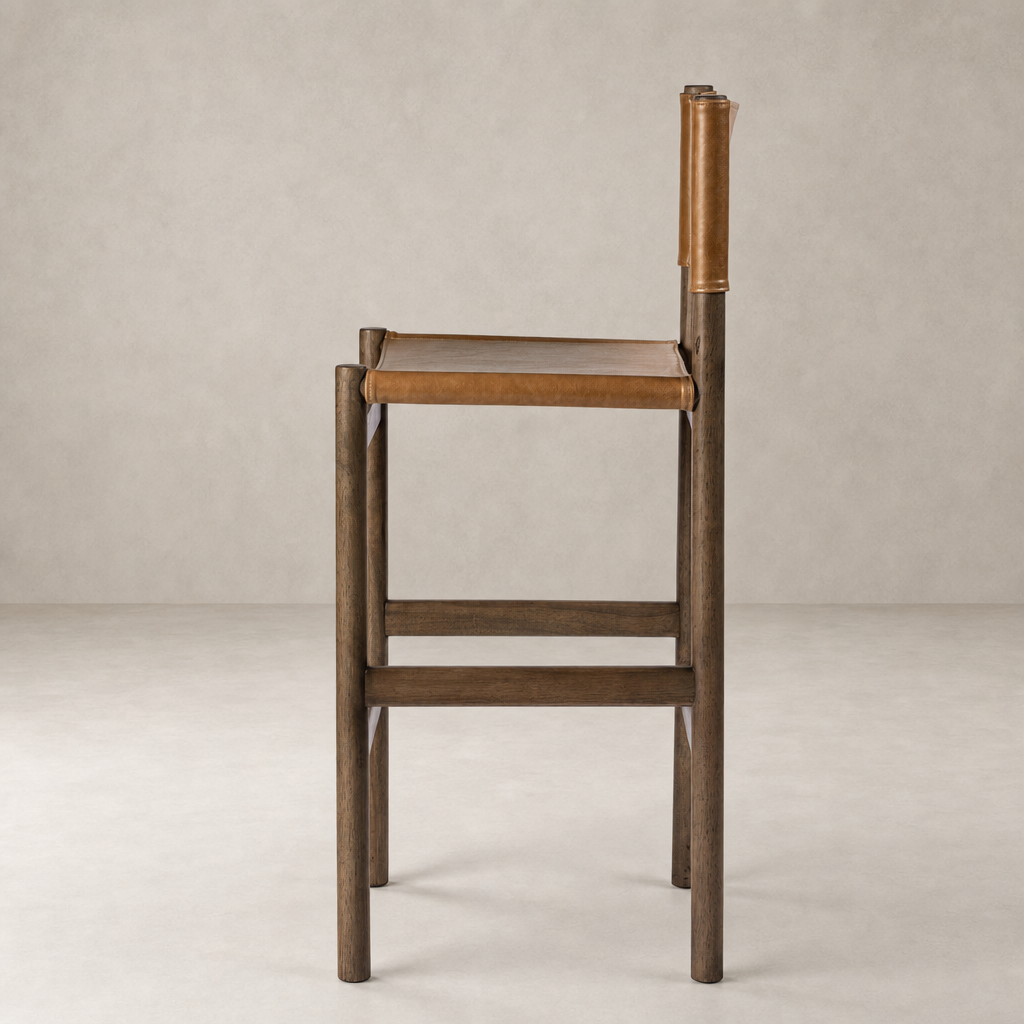 Bremen Bar + Counter Stool in Sonoma Butterscotch with sleek wooden frame and leather seat.