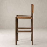 Bremen Bar + Counter Stool in Sonoma Butterscotch with sleek wooden frame and leather seat.
