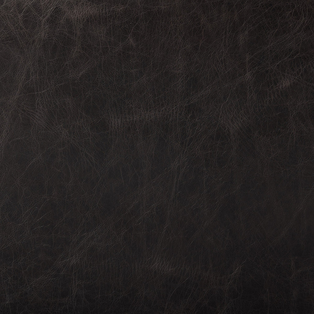 Close-up of the textured charcoal parawood finish of Bremen Bar + Counter Stool.