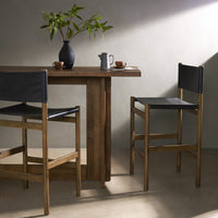 Bremen Bar + Counter Stool in Sonoma Black with solid parawood frame and sleek design.
