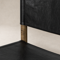 Close-up of Bremen Bar + Counter Stool in Sonoma Black with solid Parawood legs.