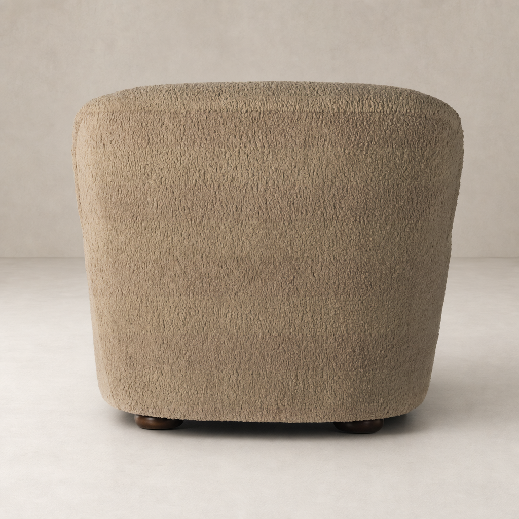 Ojai Chair in Sheepskin Camel with a soft, textured finish and rounded silhouette.