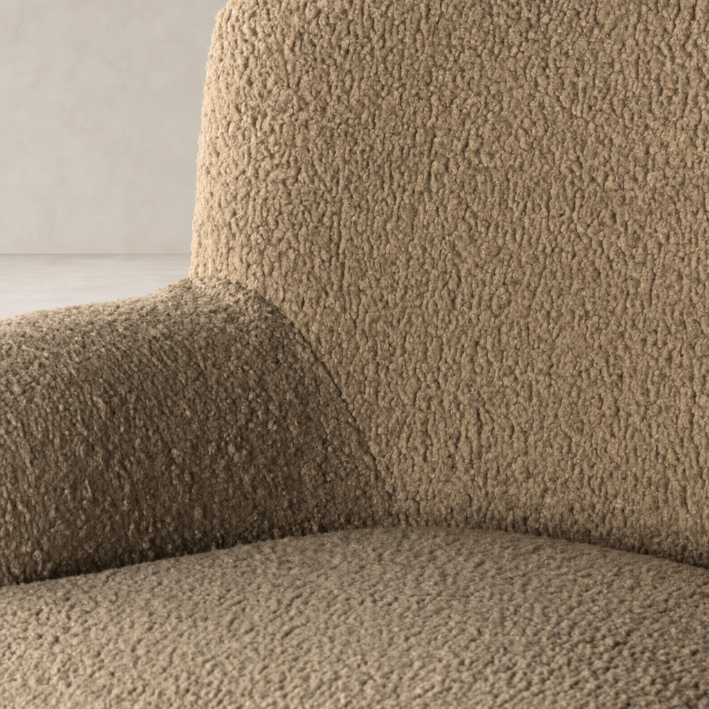 Close-up of Ojai Chair in Sheepskin Camel, showcasing its soft, textured fabric.