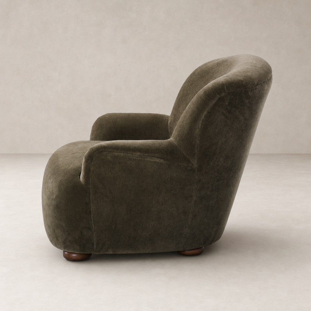 Olive Malmo fabric Ojai Chair featuring a rounded silhouette and warm wooden legs.