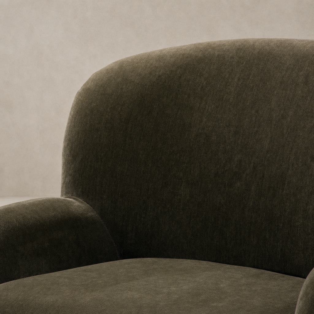 Malmo Olive Ojai Chair with soft, rounded arms and plush upholstery.