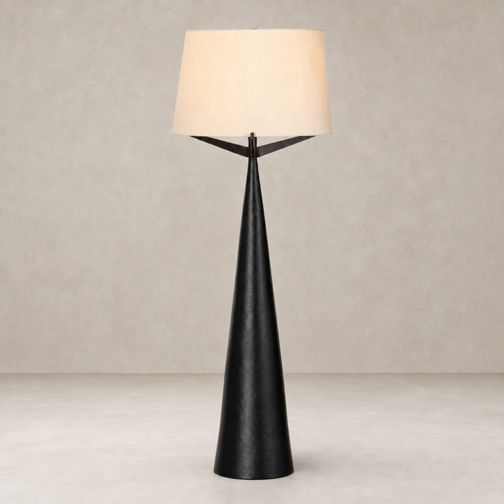 Stylish floor lamp in hammered black aluminum with a soft beige shade.