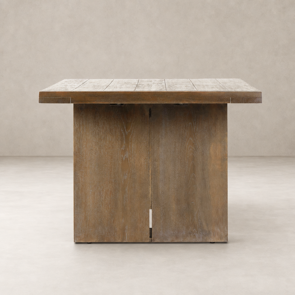 Sevilla Dining Table in Worn Oak featuring a sturdy, rectangular top and sleek base.