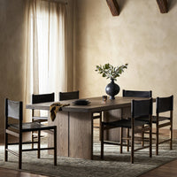 Sevilla Dining Table in worn oak, featuring a sleek, rectangular design and elegant texture.