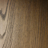 Close-up of Sevilla Dining Table's textured worn oak surface showcasing its natural grain.