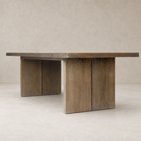 Sevilla Dining Table in worn oak featuring a sleek rectangular design with sturdy base.