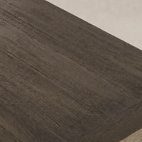 Sevilla Dining Table in worn oak showcasing a richly textured surface and sleek edges.