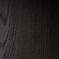 Close-up of the textured surface of Sevilla Dining Table in worn black oak.