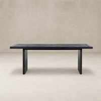 Sevilla Dining Table in worn black oak with a minimalist rectangular design.