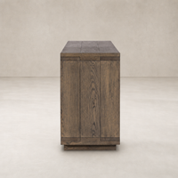 Whitby Sideboard in worn oak featuring a sleek, modern design with clean lines.