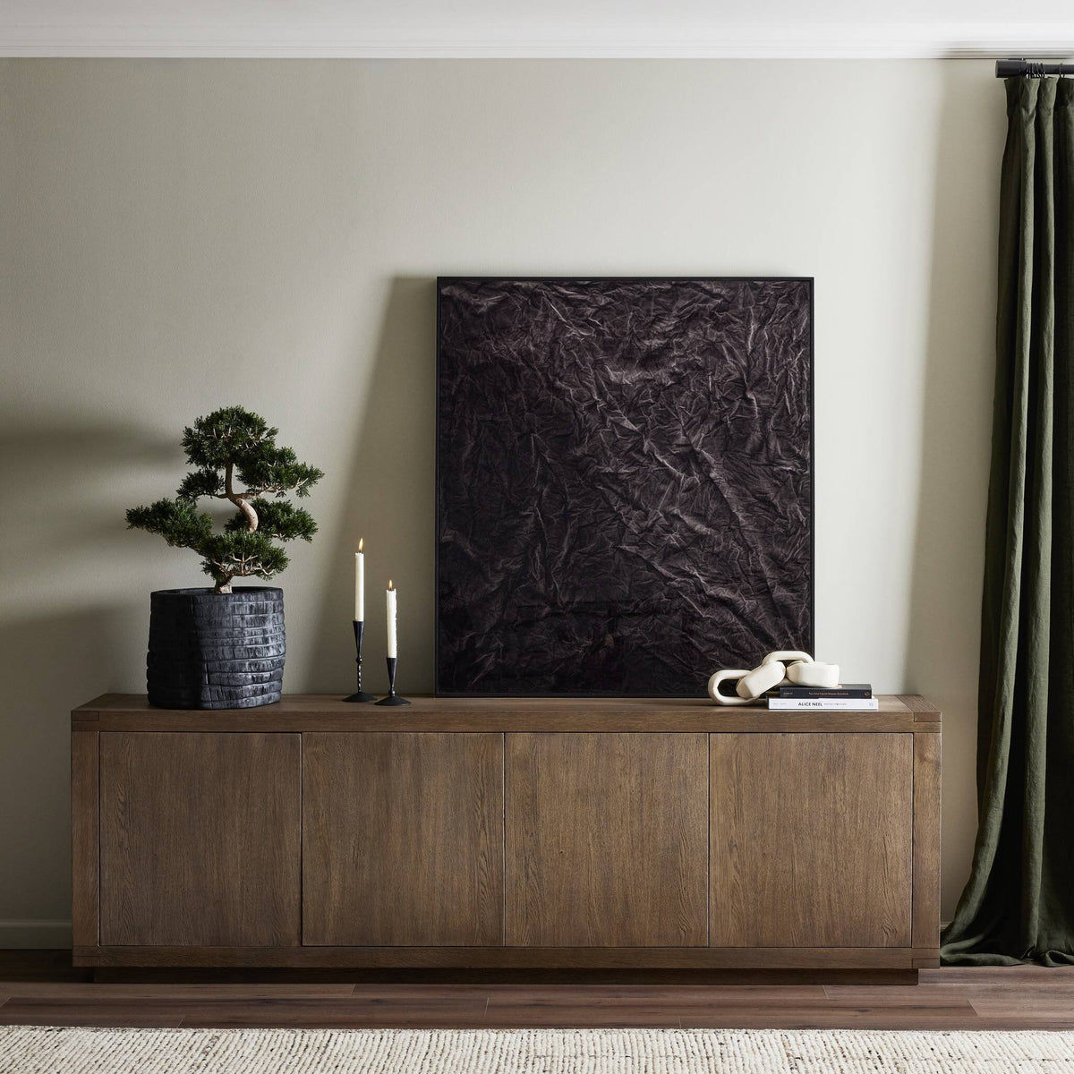Worn Oak Whitby Sideboard featuring sleek design in a modern living room setting.