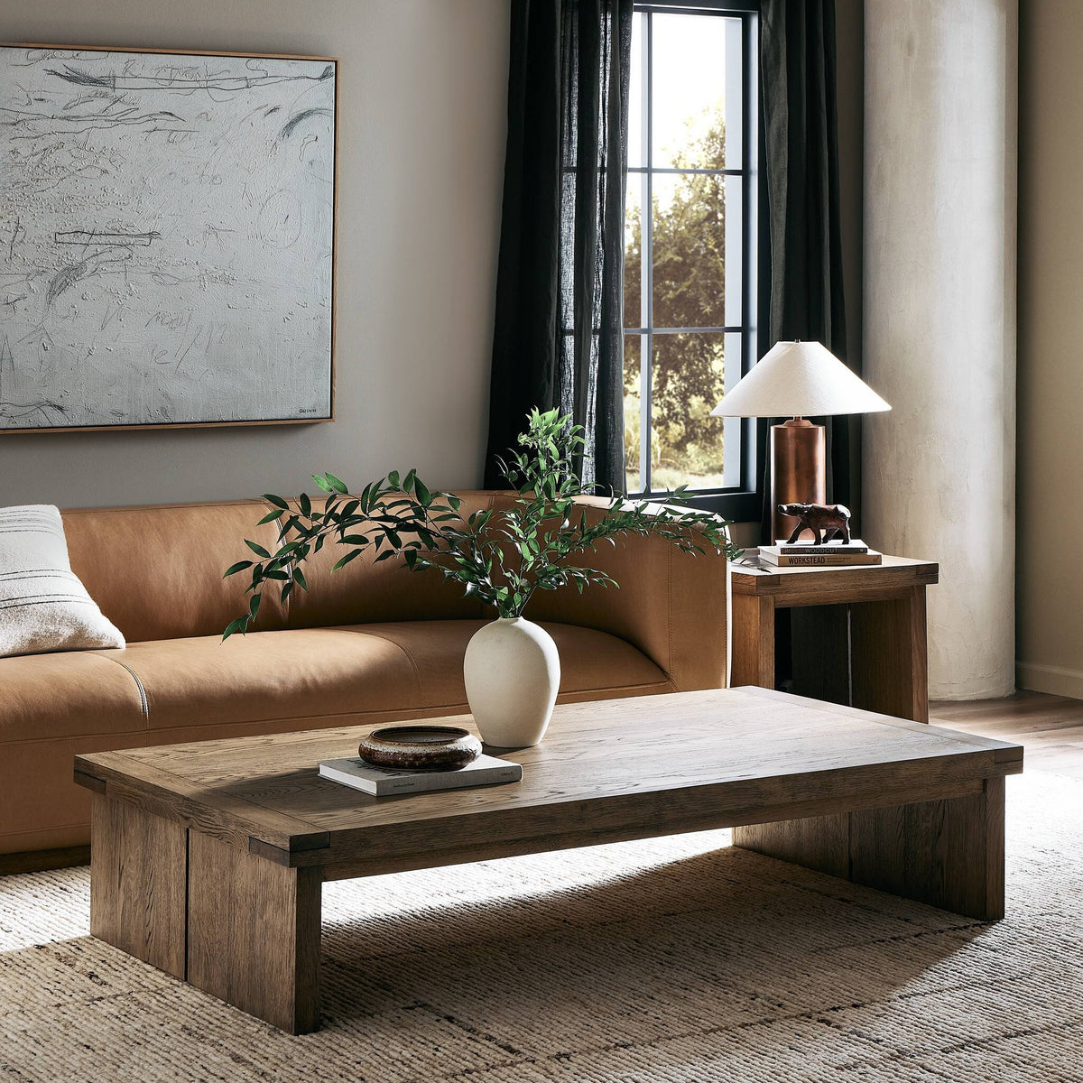 Darby Coffee Table in Worn Oak showcasing a modern design with clean lines.
