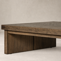 Worn Oak Darby Coffee Table with a sturdy, flat top and block legs.