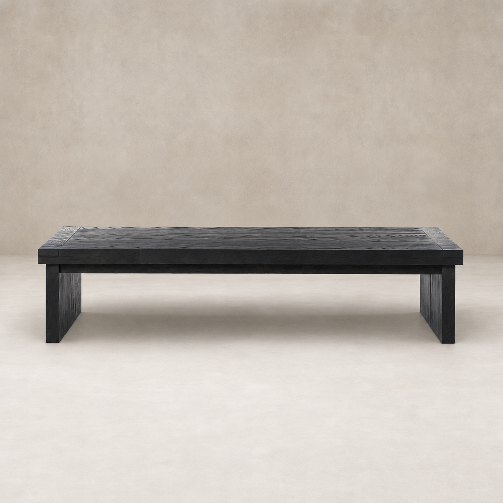 Darby Coffee Table in worn black featuring a sleek rectangular design with textured finish.