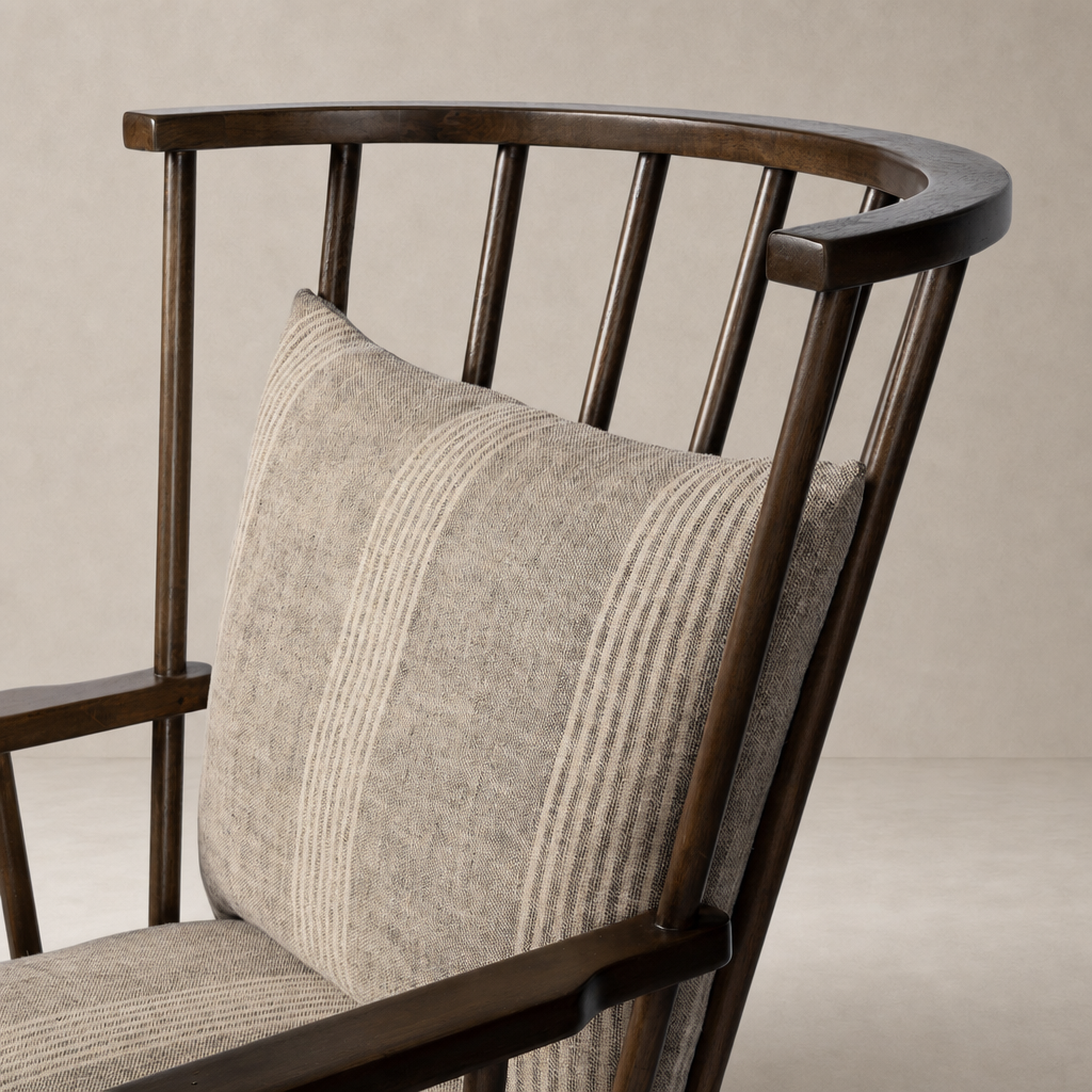 Whitley Chair in Manchester Flint with a wood frame and textured patterned cushion.