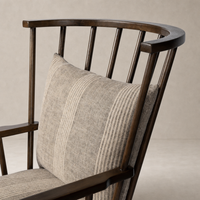 Whitley Chair in Manchester Flint with a wood frame and textured patterned cushion.
