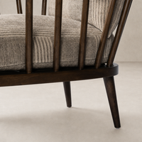 Whitley Chair in Manchester Flint featuring sleek wooden frame and textured upholstery.