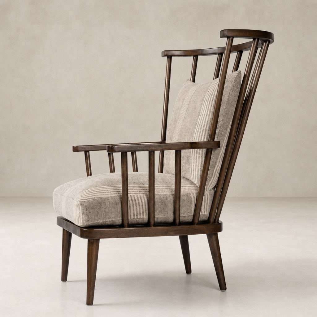 Whitley Chair in Manchester Flint showcases a stylish design with wooden slats and plush upholstery.