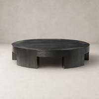Round Hastings Coffee Table in charcoal oak with smooth, modern edges.