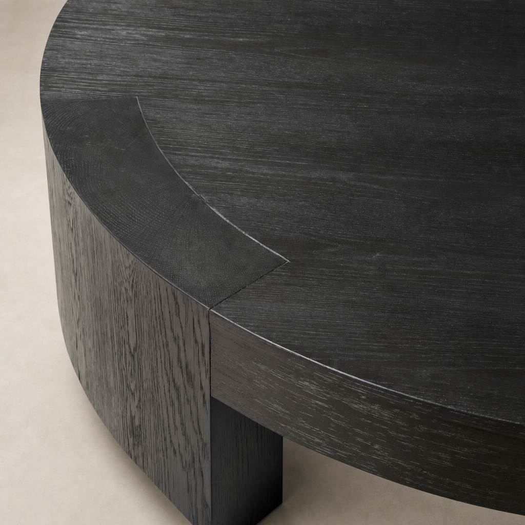 Hastings Coffee Table in Charcoal Oak with smooth, rounded edges and rich texture.